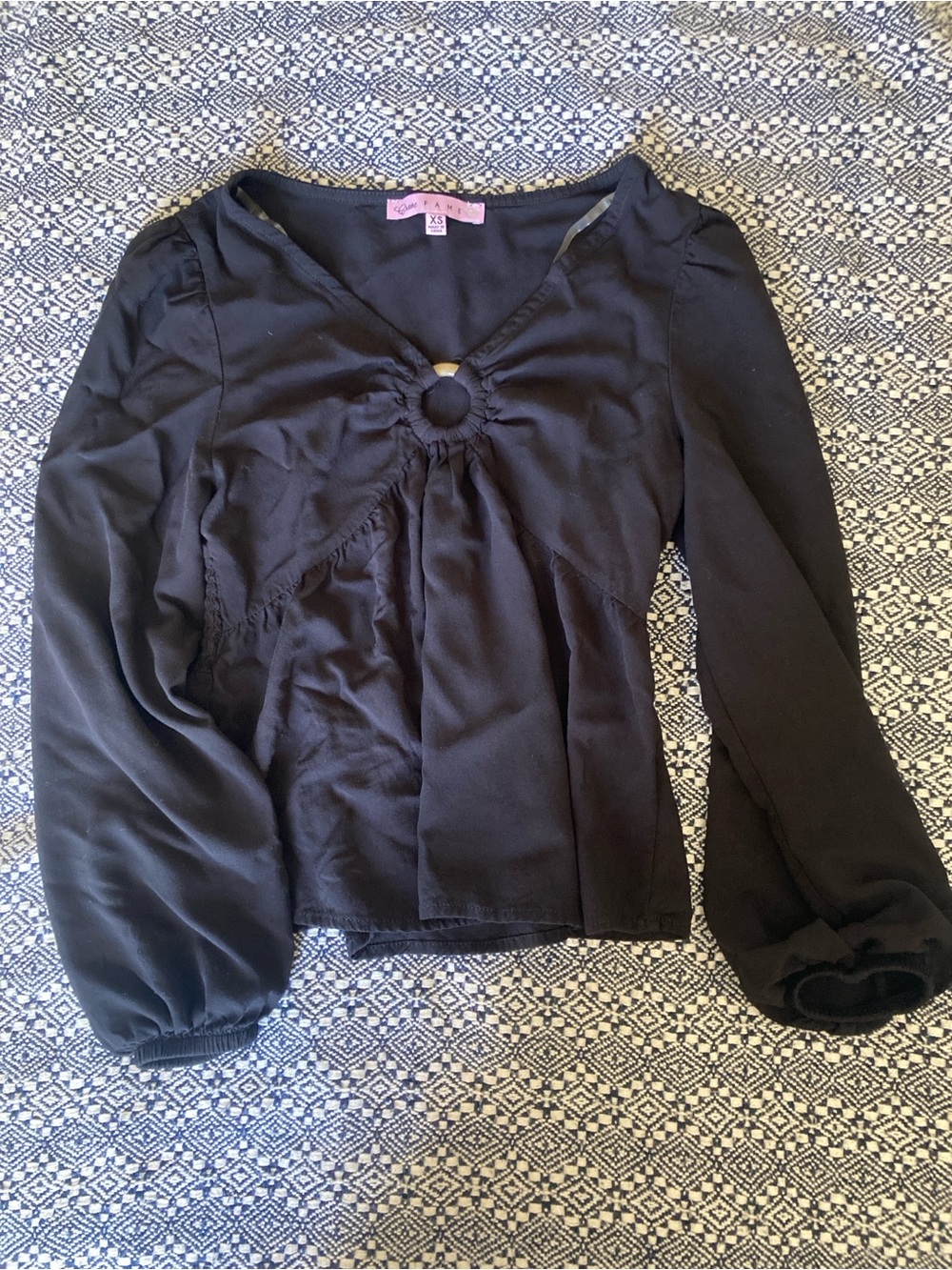 Black Long-Sleeve Blouse with Tortoise Ring Detail